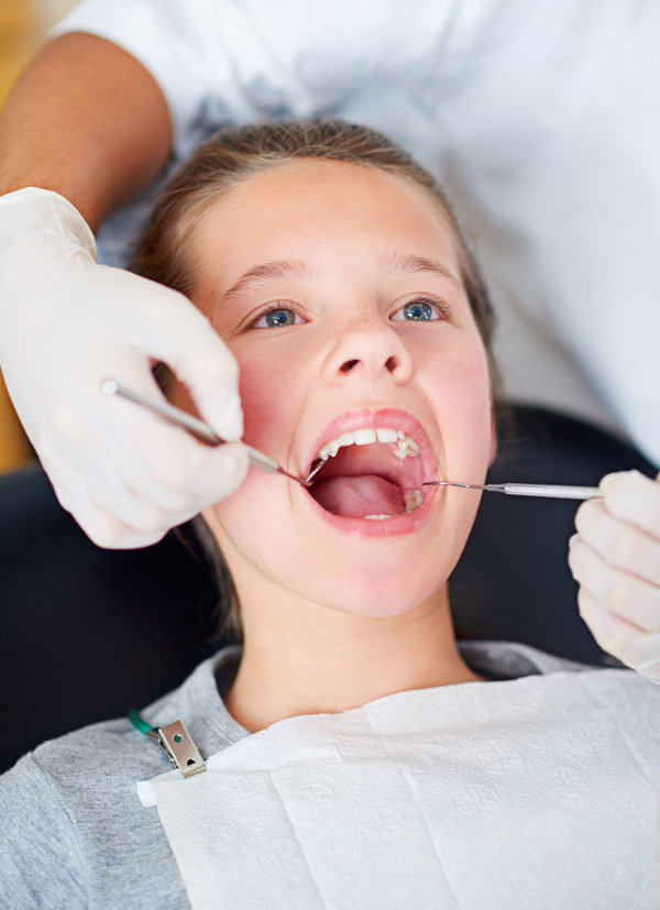 Girl, kid and mouth inspection at dentist for healthcare with dental tool, consultation or checkup for oral health. Expert, child patient and glove hand for teeth cleaning, gingivitis or medical care.