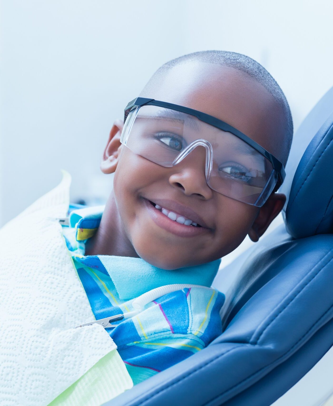 Smiling boy waiting for dental exam
